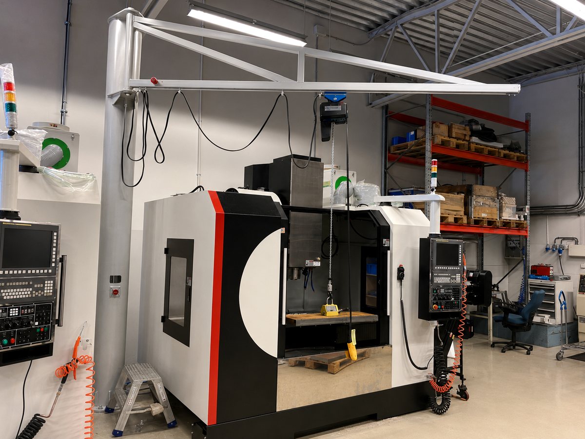 Aluminum jib crane over a CNC machining cell